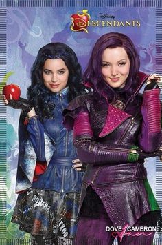 two girls dressed in disney's maleficents costumes, one holding an apple