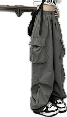 Combat Style Baggy Wide Leg Parachute Pants, Winter Baggy Cargo Jeans, Baggy Combat Parachute Pants With Wide Legs, Baggy Combat Cargo Jeans With Pockets, Baggy Combat Pants With Multiple Pockets, Baggy Combat Bottoms With Pockets, Baggy Full-length Utility Parachute Pants, Baggy Techwear Parachute Pants With Multiple Pockets, High Waist Winter Cargo Pants With Cargo Pockets