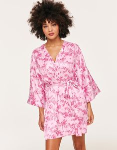 The Izabella Robe is the perfect piece of sleepwear for your romantic moments. Made with soft and luxurious satin this robe features a self-tie closure. (Available in sizes XS-XL.) Feminine V-neck Robe For Sleep, Spring Satin V-neck Robe, Satin V-neck Robe For Spring, Spring V-neck Satin Robe, Spring Satin Kimono For Loungewear, Satin V-neck Robe For Loungewear, Summer Satin Robe, Pink Spring Robe For Bedtime, Pink Feminine Robe For Sleepover