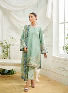 3 Piece Embroidered Suit for Women Description : This three-piece luxury design is crafted on fine fabric featuring alluring embroidery on shirt and dupatta with the look being completed with plain straight pants. Fabric: Cotton Organza Country of Origin : Pakistan General Care Instruction : Hand Wash recommended or dry clean. Color may bleed so please be mindful of other items with it. General Disclaimer   --  Size chart provides reference sizes and actual sizes might be slightly different from the size chart.   --  Actual colors of the outfit may vary from the colors being displayed on the screen Embroidered Mulmul Palazzo Set In Pista Green, Embroidered Pista Green Mulmul Palazzo Set, Unstitched Pista Green Palazzo Set With Zari Work, Elegant Designer Mulmul Palazzo Set, Designer Mulmul Palazzo Set With Resham Embroidery, Pista Green Mulmul Palazzo Set For Wedding, Eid Cambric Lawn Suit With Intricate Embroidery, Elegant Mulmul Palazzo Set With Dupatta, Semi-stitched Embroidered Lawn Suit