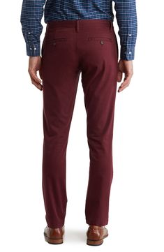 A solid hue makes these chino pants a versatile, everyday classic staple for your closet. 9" rise, 32" inseam (size 32x32) Trim fit Zip fly with button closure 2 front slash pockets; 2 back button welt pockets 97% cotton, 3% spandex Machine wash, tumble dry Imported Model stats: 6'1" height, 32" waist. Model is wearing size 32x32. Maroon Dress Pants Outfit, Slim Fit Chinos With Welt Pockets For Fall, Slim Fit Cotton Chinos For Business Casual In Fall, Slim Fit Chinos For Business Casual In Fall, Fall Slim Fit Chinos For Business Casual, Slim Fit Straight Leg Solid Chinos, Solid Color Slim Fit Straight Leg Chinos, Slim Fit Straight Leg Chinos, Fitted Chinos For Fall With Straight Hem