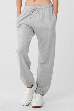 Cool down, warm up — the choice is yours with the Chill Sweatpant. Designed with ultra-soft, breathable French terry and a non-fuzzy, anti-cling interior, this lightweight bottom is made to hang or make moves. Classic cuffed bottoms, external drawcords and side-zippered pockets make this an everyday essential to wear on repeat. Soft, lightweight everyday sweatpant For working out and wearing out Designed & uniquely fit for every size Wear-tested by our in-house team for the perfect fit Comfortable Full-length Bottoms, Alo Yoga Solid Color Pants With Pockets, Alo Yoga Solid Pants With Pockets, Gray Full-length Jogging Pants, Sporty Bottoms With Side Pockets For Lounging, Loosely Fitted Solid Sweatpants For Sports, Comfortable Solid Color Lounge Pants, Solid Relaxed Fit Sportswear Bottoms, Sporty Sweatpants With Elastic Waistband For Lounging