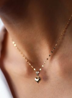 14k Gold  3D Heart Necklace, Puffy Heart Pendant with Sequin Chain, Real Gold Jewellery, Gift for Her, Price Performance Gold NecklaceMaterial: Solid GoldKarat: 14 K (585)Approximate weight : 1,56 Gr (16.8 inch Chain İncluded)Available in different chain lengths.As with all of our products, this item is handmade and made to order.Want to Check Out More from Our SectionsFİEMMA http://www.etsy.me/3ukWhjeGold Rings http://www.etsy.me/39E9NGSGold Necklaces http://www.etsy.me/31NdjtOGold Bracelets ht Valentine's Day Gold Plated Heart Cut Necklace, 14k Gold Necklace With Heart Charm And Cut, 14k Gold Pendant Charm Necklace For Valentine's Day, Heart Cut Jewelry With Heart Charm For Valentine's Day, 14k Gold Delicate Heart Cut Chain Jewelry, Yellow Gold Heart Clavicle Chain Jewelry, 14k Gold Clavicle Chain Necklace For Valentine's Day, Dainty 14k Gold Necklaces With Heart Beads, Dainty 14k Gold Necklace With Heart Beads