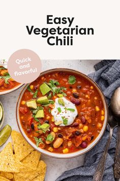 an easy vegetarian chili recipe in a bowl with tortilla chips and avocado