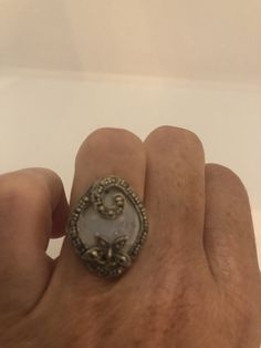 Vintage hand made about an in long Mother of Pearl set in 925 Sterling Silver Marcasite ring I have size 5.5 Can be re sized for you, my jeweler would charge $10 All rings are shipped in a nice gift box. Check out our over a THOUSAND great reviews Engraving is $4 per letter and is not always perfect depending on the piece. It can take a few days if the jeweler is busy. This is payable to Paypal Judithsltd@gmail.com Handmade Silver Adjustable Butterfly Ring, Unique Sterling Silver Nickel-free Butterfly Ring, Unique Nickel-free Sterling Silver Butterfly Ring, Nickel-free Sterling Silver Butterfly Ring, Unique Sterling Silver Butterfly Ring, Silver Sterling Silver Moonstone Ring As Gift, Unique Sterling Silver Butterfly Open Ring, Unique Sterling Silver Open Butterfly Ring, Antique Silver Moonstone Ring