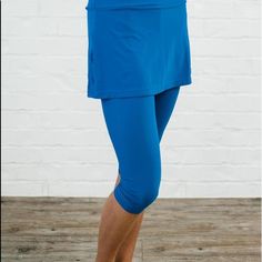 Brand New Never Worn Still In Package. Royal Blue 82% Nylon 18% Spandex - Upf 50+ Sun Protection - High Waisted: Wide Waistband Sits Just Below Your Natural Waist For Slenderizing Tummy Control - Capri Length Leggings Hit Below The Knee - Attached Skirt Hits Mid High Thigh, Specially Designed For Coverage. - Inseam Length 17.4” (Size S) - Skirt Length 12.2” (Size S) Sporty Stretch Blue Swim Skirt, Stretch Bottoms For Pilates In Summer, Blue Elastane Activewear For Spring, Blue Swim Skirt With Built-in Shorts For Workout, Blue Stretch Swim Skirt Casual Style, Blue Stretch Casual Swim Skirt, Casual Blue Stretch Swim Skirt, Blue Activewear With Built-in Shorts, Blue Stretch Swim Skirt For Sports