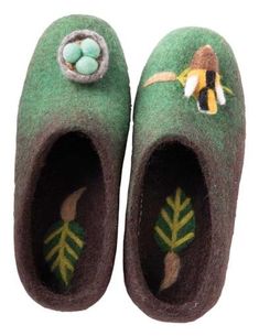 Nest eggs and a bird are whimsically attached at the toes. Hand crafted works of art, each pair is dyed and formed by artisans in Nepal. Suede soles.Two sizes available: Small (5-6) and Large(9-11) Felt Slippers, Wool Shoes, Romantic Home Decor, Felted Slippers, Wool Slippers, Boiled Wool, Winter Time, Birdy, Works Of Art