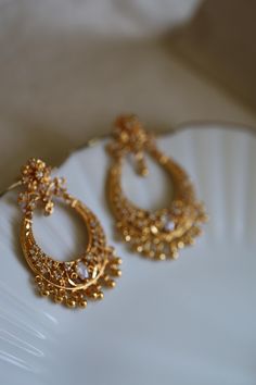 Festive earrings Ear Rings In Temple Jewelery, Luxury Handmade Jewelry For Diwali, Luxury Traditional Jhumkas For Festivals, Luxury Chandbalis With Tilla For Festivals, Luxury Gold Plated Fusion Earrings, Luxury Earrings For Diwali Celebration, Luxury Dangle Chandbalis For Festivals, Luxury 22k Gold Danglers For Diwali, Luxury Chandbalis With Intricate Design