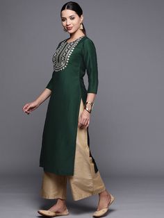 Colour: greenFloral yoke designRound neckThree-quarter, regular sleevesStraight shape with regular styleKantha work detailCalf length with straight hemMachine weave regular cotton Yoke Design, Satin Saree, Kantha Work, Anarkali Suit, Kurta Designs, Anarkali, Fit & Flare, Three Quarter, Green Color