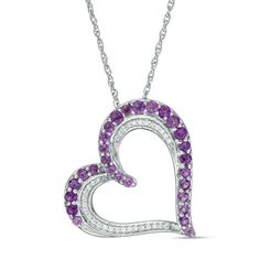 Make an exquisite proclamation of love with this dazzling gemstone and diamond heart pendant. Crafted in sterling silver, this tilted open style is outlined almost entirely with bright purple amethyst accents. Sparkling diamonds line the inside edges of the sculpted frame, further enhancing the design. Enchanting with 1/10 ct. t.w. of diamonds and a brilliant buffed luster, this heart suspends close to hers along an 18.0-inch rope chain that secures with a spring-ring clasp. White Gold Heart Cut Gemstone Necklace, White Gold Heart-shaped Jewelry With Accent Stones, Open Heart Anniversary Jewelry With Prong Setting, Anniversary Open Heart Jewelry With Prong Setting, Mother's Day Heart-shaped Jewelry With Accent Stones, Mother's Day Jewelry With Heart Cut Accent Stones, Mother's Day Heart Cut Jewelry With Accent Stones, Purple Heart Necklace For Anniversary, Valentine's Day Purple Diamond Jewelry