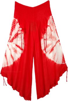 A cropped wide-leg pant. features smocked elastic waistband, 2 front tie pockets, and tie ruffle leg opening. A chic pair of wide-leg culotte pants in red with a white tie-dye that goes around the middle of the pants, back, and front. This style is totally fresh and you will be ahead of fashion. The front pockets come with a functional tie-up string that gives it a boho look. Similar functional tie-ups are attached at the bottom of these pants and can be pulled to make the leg opening higher. Th Summer Parachute Pants With Drawstring, Summer Harem Pants With Drawstring, Bohemian Wide-leg Pants With Drawstring, Bohemian Wide-leg Drawstring Pants, Bohemian Drawstring Harem Pants For Spring, Summer Drawstring Wide-leg Harem Pants, Summer Wide-leg Harem Pants With Drawstring, Red Drawstring Bottoms For Summer, Red Drawstring Summer Bottoms