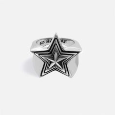 The iconic RAFTAF piece. Wear the star that brightens your dreams. MATERIAL  Made of 925 sterling silver, solid silver FINISHING (OPTIONAL) 925 Sterling Silver RING SIZE (OPTIONAL) Small: 6.5 US (Diameter: 16.8 mm) Medium: 8.5 US (Diameter: 18.4 mm) Large: 9 US (Diameter: 19.1 mm) X Large: 11.5 US (Diameter: 21 mm) WEIGHT 14 g PACKAGING You are in the right place to make your special gifts for him or her. All orders are nicely packaged ready to gift in cool RAFTAF boxes. DESIGN & CRAFTMANSHIP All RAFTAF pieces are designed by our talented and ambitious design team. Production process is carried out by experienced craftsmen in the Istanbul Grand Bazaar, which is famous for jewelry production for centuries. Please note that slight changes in colour and traces of the artisanal process are par Star Diamond Ring For Men, Tupac Star Ring, Sirius Star Ring, Star Gifts For Men, Star Jewelry Ring, Silver Star Ring, Boxes Design, Special Gifts For Him, Handcrafted Silver Jewelry