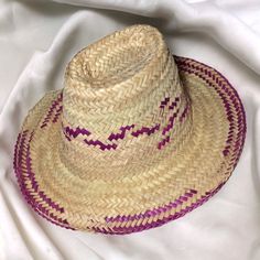 Handcrafted in Morocco, this exquisite straw hat is a stylish blend of tradition and modern flair. Made from natural straw, the hat features intricate weaving, showcasing the skilled craftsmanship of Moroccan artisans. Its broad brim offers a touch of elegance while providing ample shade, making it a perfect accessory for sunny days. Whether you're strolling through a market or lounging by the beach, this Moroccan straw hat effortlessly combines fashion and functionality, adding a touch of North African charm to your ensemble. Elevate your style with this unique, culturally-inspired piece. Size : 40cm The product is handmade, so please allow some small size differences ♢C o n t a c t Us:  If you have any thought in mind, don't hesitate to contact us by sending a message, our customer servi Straw Weaving, Resort Chic, Style Marocain, Boho Mode, Sun Protection Hat, Bohemian Accessories, Outdoor Fashion, Coastal Chic, Eco Friendly Fashion