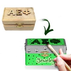 a person is holding a brush near a small box with letters on it and an arrow pointing to the word aep