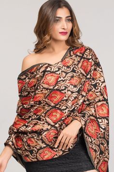 "Our Mandira Embroidered Shawl features exquisite multicolor embroidery on soft 100% viscose that has the look and feel of wool, but can be worn by people with wool sensitivities. This fine embroidered shawl showcases the intricate embroidery traditions of Northern India in rich earthen hues on a black base. Sevya offers a stunning collection of embroidered Indian shawls, in a range of patterns and colors to suit any occasion. Dimensions: 28\" x 72\"" Poem Inspiration, Multicolor Embroidery, Embroidered Shawl, Floral Shawl, India Colors, Fur Shawl, Wool Shawl, Women Shawl, Wool Scarf