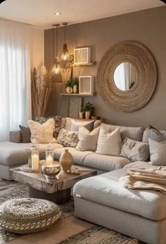 a living room filled with lots of furniture next to a large window covered in curtains