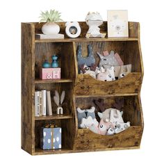 a wooden shelf filled with lots of stuffed animals