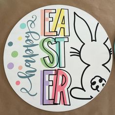 a paper plate with the words eat, sit, and easter written on it