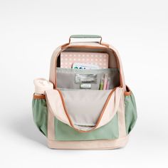 A backpack that's extra comfy and ready to handle all the adventures of the day. Combining colorblocks of candyfloss pink and mint green with pops of coral trim, the kids' medium knapsack is constructed of supremely durable polyester made from recycled water bottles. A roomy interior holds everything your kid needs-books, school supplies, extra layers-and there's a padded pocket to keep their tablet protected. Outside pockets hold snacks, water bottles and more. Pair this book bag with the match Playful Backpack For Everyday Use, Playful Pink Backpack For Everyday Use, Playful Backpack For Everyday Use And Back To School, Cute Pink Bags For Outdoor Activities, Playful Everyday Standard Backpack, Cute Pink Backpack For Outdoor Activities, Color Block School Bags For Back To School, Cute Green Backpack For Everyday Use, Cute Pink Bag For Outdoor Activities