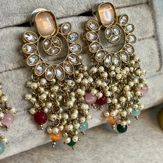 The most stunning multi colour crystal drop earrings, lightweight and adorned with zircon crystals and beauitful bead work. Measurements 2.5 inch Width x 1.5 inch length Perfect for any glam occasion.  Ready to ship! Luxury Festive Chandbalis With Stone Work, Luxury Meenakari Chandbalis For Eid, Luxury Kundan Chandelier Earrings For Diwali, Luxury Multicolor Temple Jewelry Chandbalis, Pakistani Style, Jewellery Gift, Crystal Drop Earrings, Crystal Drop, Style Gift