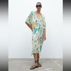 Radiate Confidence And Style In The Zara Printed Tunic Dress, Multicolored With Sparkle Thread - Size M/L, A Brand New Piece Designed To Make You Feel Effortlessly Chic! Size M/L Nwt Casual Multicolor Print V-neck Dress, Multicolor Print V-neck Summer Dress, Casual Green Dress For Beach Cover-up, Casual Multicolor Print Summer Midi Dress, Casual Multicolor Print Midi Dress For Summer, Patterned V-neck Midi Dress For Beach, Multicolor Print V-neck Beach Dress, Casual Printed Tunic Maxi Dress, Multicolor Beachwear Midi Dress As Beach Cover-up