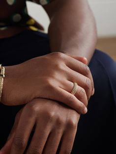 John Hardy is known for its intricate jewellery that's handcrafted using ancient Balinese weaving techniques. This 'Kami' ring is made from 14-karat gold and has a layered chain link design for depth and dimension. Intricate Design 14k Yellow Gold Bands, Yellow Gold Bands With Intricate Design In 14k, 14k Yellow Gold Bands With Intricate Design, Diamond Jewelry With Ring Detail For Promise, Diamond Ring Jewelry For A Promise, Diamond Promise Ring Jewelry, Timeless Yellow Gold Promise Jewelry, Yellow Gold Brass Promise Ring, Yellow Gold Polished Promise Jewelry