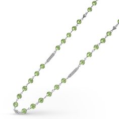 Peridot and sterling silver Caviar beaded necklace finished with a toggle clasp. Necklace adjustable 16 to 18 inches. Green Round Bead Necklaces With Sterling Silver Clasp, Green Beaded Necklace With Sterling Silver Clasp, Green Round Beads Necklace With Sterling Silver Clasp, Green Necklace With Sterling Silver Clasp And Round Beads, Green Round Bead Necklace With Sterling Silver Clasp, Elegant Peridot Round Beads Jewelry, Green Sterling Silver Necklace, Green Polished Beads Sterling Silver Jewelry, Green Sterling Silver Jewelry With Polished Beads