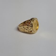 ♥ Coin Information ♥Type: CoinMetal Content: 1/20OZCountry: ChinaDenomination: 5 YuanComposition: .999 GoldYear: 1991♥ Ring Information ♥Details: Nugget Band Material: 14k Yellow GoldDimensions: 19mm x 20mm Weight: 12 Grams Size: 9.75Size can be adjusted – one size up/down is $50 two sizes up/down is $60. Once ring is adjusted it is final sale. 22k Gold Oval Jewelry For Anniversary, Collectible Luxury Gold Rings, Antique 22k Gold Jewelry For Anniversary, Yellow Gold Round Signet Ring With Prong Setting, Heirloom Style Yellow Gold Cluster Ring With Bezel Setting, Heirloom Nugget Rings As Gift, Heirloom Cluster Ring In Yellow Gold With Bezel Setting, Engraved 22k Yellow Gold Rings, Heirloom 14k Gold Signet Ring For Commemoration