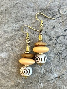 Tribal Boho Earrings African Trade Bone and Lost Wax Brass Beads Everyday Beige Jewelry With Wooden Beads, Handmade Beige Beads For Gifts, Adjustable Gold Beaded Earrings With Large Beads, Gold Bohemian Earrings With Wooden Beads, Gold Round Earrings With Large Beads, Beige Jewelry With Dangling Beads As Gift, Beige Jewelry With Dangling Beads For Gift, Bohemian Gold Beaded Earrings With Wooden Beads, Beaded Beige Earrings As Gift