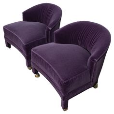 two purple chairs sitting next to each other