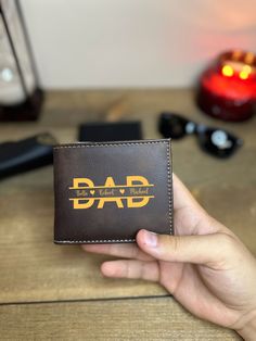 "Dad Leather Wallet With Children Names, Custom Leather Engraved Wallet, Gift For Father's Day, Minimalist Wallet, Handmade Men's Wallet ✦Do you need a high-quality, protective wallet that will hold your valuables in a secure and stylish way? You have come to the right place! ✦Our wallets are made from the finest vegetable-tanned full-grain leather. The perks of having the wallet made from premium quality full-grain leather makes the wallet age backward; the color becomes more vibrant and pretty Child Names, Children Names, Leather Engraved, Leather Engraving, Engraved Wallet, Wallet Minimalist, Men's Wallet, Clip Wallet, Minimalist Wallet