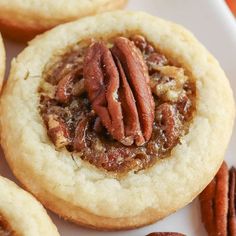 several pecan pies on a white plate