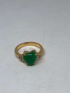 Vintage Lucky Green Nephrite Jade ring Large green nephrite jade Ornate German Silver Vintage ring, does not tarnish, NOT sterling Sizes 6, 8,or 9 My jeweler can custom re size for a $10-$20 fee All rings are shipped free in the US in a nice gift box. Check out our over a THOUSAND great reviews Engraving is $4 per letter and is not always perfect depending on the piece. It can take a few days if the jeweler is busy. This is payable to Paypal Judithsltd@gmail.com Fine Jewelry Green Heart Ring For May Birthstone, Green Heart Ring For May Birthstone, Fine Jewelry Style, Green Heart Ring For May Birthstone, Fine Jewelry Green Heart Shaped Ring, Green Heart-shaped Fine Jewelry Ring, Heart-shaped Green Emerald Ring For May Birthstone, Green Gemstone Heart Cut Rings, Green Gemstone Rings With Heart Cut, Heart Shaped Green Emerald Ring For May Birthstone