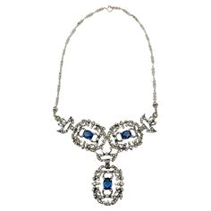 A Sterling Silver Vintage Castlecliff Sapphire Paste Necklace inspired by Renaissance jewellery styles. The delicate sterling silver scroll and leaf motif setting making the perfect backdrop for the tiny clear chaton pastes and trio of deep sapphire blue paste stones. A fancy patterned chain, with craftmanship and style reminiscent of art deco design finishes the piece to perfection. A rarer piece of exquisitely designed Castlecliff jewellery in forever classic blue and white hues. Elegance and Cabin Door, Leaf Motif, Vintage Jewels, Timeless Treasures, Sapphire Blue, Art Deco Design, Classic Blue, Vintage Jewellery, Vintage Stil