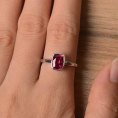 It is a lab ruby ring. The main stone is 6 mm*8 mm cushion cut.weight about 1.82 carats. The basic metal is sterling silver and plated with rhodium. To change the metal to a solid gold (white/rose) or platinum is also available, please ask for a quotation if you want. You can also go to my shop Home for more elegant rings: https://www.etsy.com/shop/godjewelry?ref=hdr_shop_menu Ruby is July birthstone More ruby rings: https://www.etsy.com/shop/godjewelry?ref=seller-platform-mcnav&section_id=2 Cushion Cut Ruby Jewelry Gift, Cushion Cut Ruby Jewelry As Gift, Cushion Cut Ruby Jewelry For Gift, Fine Jewelry Ruby With Radiant Cut, Anniversary Lab-created Ruby Cushion Cut Jewelry, Square Cut Ruby Jewelry Fine Jewelry, Sterling Silver Cushion Cut Gemstone Jewelry, Gift Ruby Ring With Accent Stones Cushion Cut, Gift-ready Cushion Cut Ruby Ring With Accent Stones