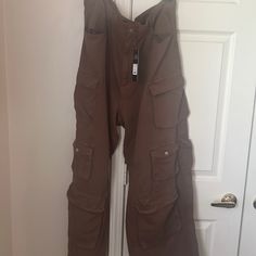 Women Nwt Fashion Nova Brown Cargo Pants Size 22 Brand / Fashion Nova Brand New Perfect For The Spring/Summer Cargo Is Very Popular Pants Thanks For Shipping By My Shop Baggy Brown Cargo Pants For Summer, Brown Straight Cargo Pants For Summer, Brown Wide Leg Cargo Bottoms, Summer Full-length Cargo Bottoms, Brown Utility Full-length Bottoms, Brown Cargo Style Full Length Bottoms, Brown Cargo Style Bottoms, Brown Wide Leg Pants With Multiple Pockets, Brown Full-length Cargo Bottoms