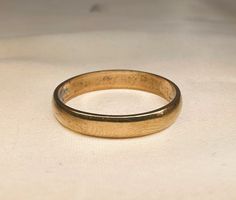 A beautiful German solid 8k yellow gold band, a timeless classic vintage band that will always look great! This mid-century vintage ring is signed 8k (333). Would make a nice gift for someone special! Material: 8k gold (hallmarked) Total weight: approx 1.6g US size: 7 1/4 (EU 54 1/2) Measures: band is 3 mm wide Vintage Thick Band Wedding Jewelry, Vintage 14k Gold Wedding Band With Decorative Designs, Vintage 14k Gold Wedding Band With Decorative Details, Vintage Yellow Gold Band Ring, Vintage Hallmarked Rings For Formal Occasions, Classic 14k Gold Wedding Band, Classic Engraved Wedding Ring With Hallmark, Vintage 14k Gold Bands, Classic Thick Band Bands As Gift