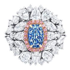 From the museum vault at Emilio Jewelry, located on New York's iconic Fifth Avenue, Center Stone: 1.20 carat + Gia certified natural Fancy Intense pure Blue VS1 CUSHION Matching: White diamonds total about 4.30 carats, pink diamonds total about 0.18 carats From The Museum Vault at Emilio Jewelry Located on New York's iconic Fifth Avenue, Hand made in the Emilio Jewelry Atelier, whom specializes in rare collectible pieces in Natural ultra rare fancy colored Diamonds and precious stones. Please in Most Expensive Jewelry, Colored Diamond Jewelry, Pear Shaped Ring, Blue Diamond Ring, Expensive Jewelry, Fancy Color Diamonds, Blue Jewelry, Three Stone Rings, Pink Diamond