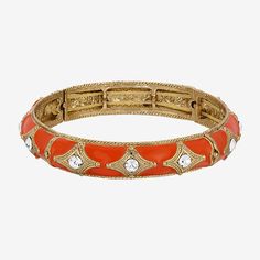 Discover a whole new hue with this stunning stretch bracelet from our 2028 collection. The color makes a bold impact with tantalizing orange tangerine that is hand-enameled, contrasting against an exotic Indonesian motif of polished gold and striking white crystals.Bead Type: EnamelFeatures: StretchCircumference: 7 InchMetal Color: Gold ToneCare: Wipe CleanBracelet Type: Stretch BraceletsMetal: AlloyIs Beaded: NoCountry of Origin: Imported Orange Bangle Stretch Bracelet For Gift, Orange Bangle Bracelets For Party, Elegant Adjustable Orange Bangle, Adjustable Orange Stretch Bracelet, Elegant Orange Bangle Bracelet, Bracelets Orange, 1928 Jewelry, White Crystals, Vintage Fits