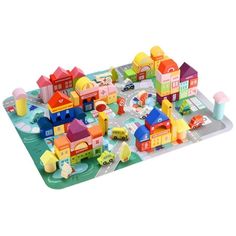 a play mat with buildings and cars on it