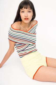 These stripes must be our all-time favorite! And the combination of the two types of yarn - peachskin and a super cute and soft terry cloth - make them all the more appealing and beach-ready. We created a few styles in this stripe, one of which is this popular off-shoulder, criss cross top that creates a beautiful neckline. Pair the top with the matching shorts for the most adorable full summer look. Content: 51% cotton, 34% nylon, 10% recycled lycra, 5% silk. Model is 5'8" and wearing size XS. Multicolor Striped Top For Summer, Multicolor Tops With Contrast Stripes For Spring, Playful Striped Tops For Beach, Playful Striped Tops For The Beach, Summer Contrast Stripe Tops For Loungewear, Summer Loungewear Tops With Contrast Stripes, Criss Cross Top, Cross Top, Types Of Yarn