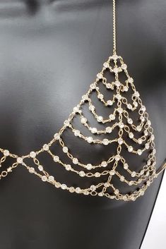 Prima Donna Gold Crystal Chain Jewelry, Glamorous Metal Jewelry For Festival, Glamorous Diamond Chain Jewelry, Elegant Chain Link Jewelry For Parties, Elegant Crystal Jewelry With Gold Chain, Silver Rhinestone Necklace With Cubic Zirconia, Gold Cubic Zirconia Necklace For Party, Glamorous Diamond Jeweled Jewelry, Gold Diamond Party Chain Necklace