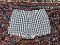 So cute! Vintage Annie Hall era gingham booty shorts by Anne Klein. They have a mid rise fit. No flaws to note. Plain weave cotton with NO STRETCH. Fits about a 25" waist or smaller. Waist (mid) 28" Rise 10" Hip 35" Inseam 2" 1950s Shorts, 1950s Women, Annie Hall, Hot Pants Shorts, Shorts Low Rise, Smaller Waist, Plain Weave, Aesthetically Pleasing, Anne Klein