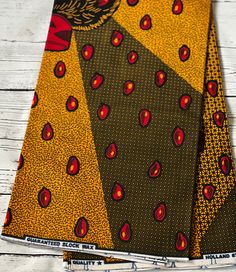 This striking bold motif with beautiful and bright colours is a modern take on African fabric. The fabric is 100% cotton and made in Nigeria. This high quality African wax print is ideal for clothing, accessories and any craft or sewing projects requirements. If you order more than one yard, we will cut multiple lengths purchases in a continuous length piece. However, please note that this fabric comes in bolts of 6yards.  Kindly note that we have taken every effort to remain true to the colours Colorful Patterned Cotton Fabric, Traditional Cotton With Colorful Pattern, Traditional Cotton Patterns With Colorful Design, Ankara Fabric With Vibrant Patterned Print, Vibrant Patterned Ankara Fabric, Traditional Red Cotton Fabric, Traditional Red Cotton Fabric And Notions, Traditional Printed Multicolor Fabric, Cotton Fabric With Graphic Print