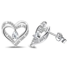 PRICES MAY VARY. ◆ Sterling silver stud earrings are earrings with two overlapping hearts, and there is a teardrop-shaped cubic zirconia in the middle of the heart. The classic earrings are inlaid with shiny cubic zirconia to make the earrings more dazzling. Love earrings symbolize eternal love, which is perfect for giving to your loved ones as Valentine's Day, anniversaries, etc.! ◆ Heart earrings are made of sterling silver and cubic zirconia. Lead-free and nickel-free hypoallergenic earrings Hypoallergenic Sterling Silver Heart Earrings For Valentine's Day, Valentine's Day Heart Cut Cubic Zirconia Earrings, Heart-shaped Sterling Silver Huggie Earrings For Valentine's Day, Heart-shaped Sterling Silver Diamond Earrings For Gift, Sterling Silver Heart-shaped Diamond Earrings For Valentine's Day, Sterling Silver Heart Earrings, Earrings For Sensitive Ears, Love Earrings, Womens Earrings Studs