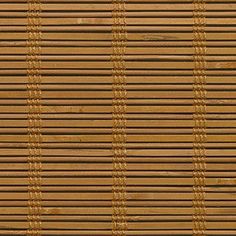 a close up view of a bamboo mat with vertical lines in brown and tan colors