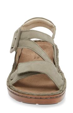 A cushy, arch-supporting footbed gives comfort to this sporty sandal designed with adjustable hook-and-loop straps for a perfect fit. 1 1/4" heel (size 38) Adjustable hook-and-loop straps Cushioned footbed with arch support Leather upper and lining/synthetic sole Imported Comfortable Slingback Footbed Sandals With Adjustable Strap, Adjustable Slingback Footbed Sandals With Arch Support, Adjustable Footbed Sandals With Arch Support And Slingback, Comfortable Leather Slingback Footbed Sandals, Adjustable Slingback Sport Sandals With Arch Support, Casual Sandals With Buckle Closure For Everyday Use, Comfortable Slingback Sandals With Cushioned Footbed, Comfortable Adjustable Slingback Sandals With Leather Footbed, Adjustable Comfortable Slingback Sandals With Leather Footbed