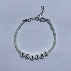 White and green Sebastian Vettel Formula 1 beaded bracelet with adjustable clasp Formula One Bracelet Ideas, Formula 1 Bracelet, Redbull F1 Bracelet, You Just Wait Sunshine Vettel, Sebastian Vettel Bowing To Car, Fan Bracelet, Jewelry Inspo, Formula 1, Arm Band