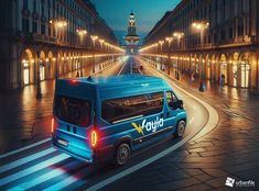 a blue van driving down a street next to tall buildings in the city at night