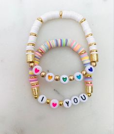 Order your set today! ❤️ Heishi Bracelets, Bracelet Valentines, Clay Bracelets, Wrist Stacks, Multiple Bracelets, Craft Beads, Beads Designs, Polymer Beads, Fun Bracelet